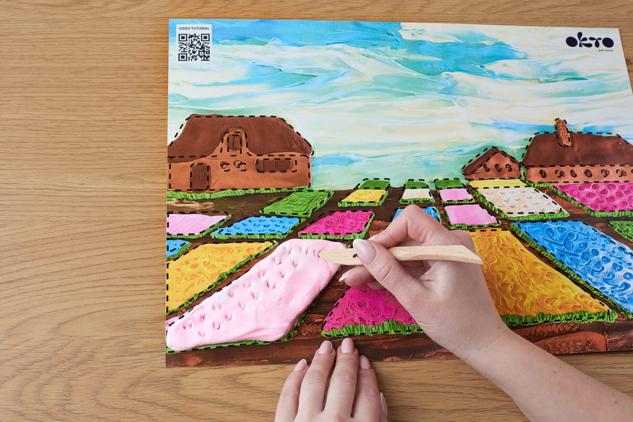 Fill the entire picture with clay and add the final touches.
