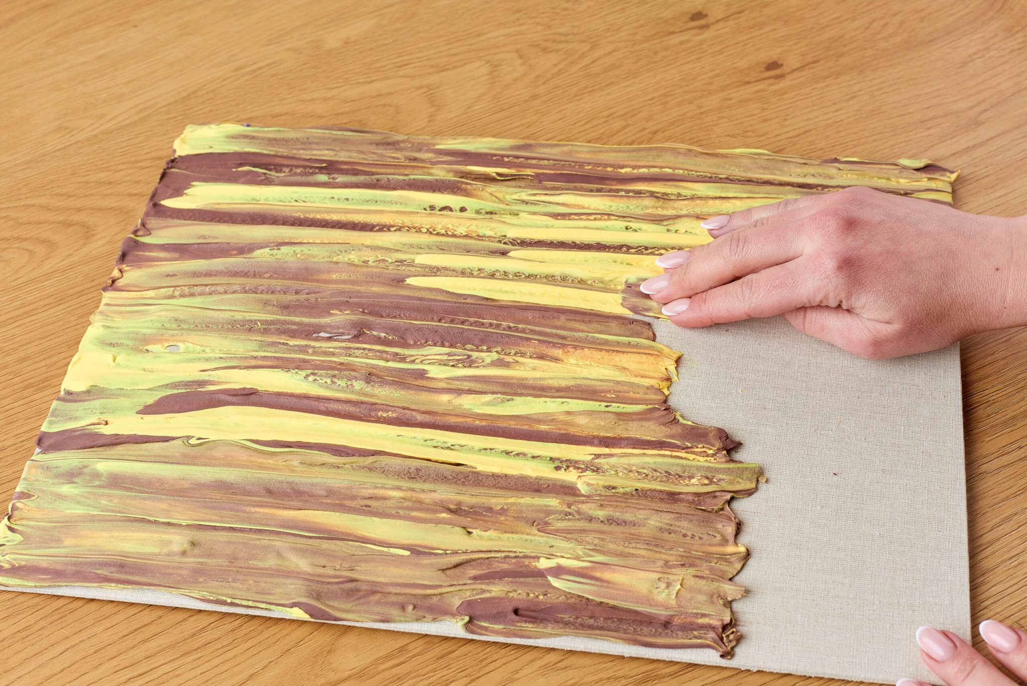 Choose a color and start spreading it with your fingers.