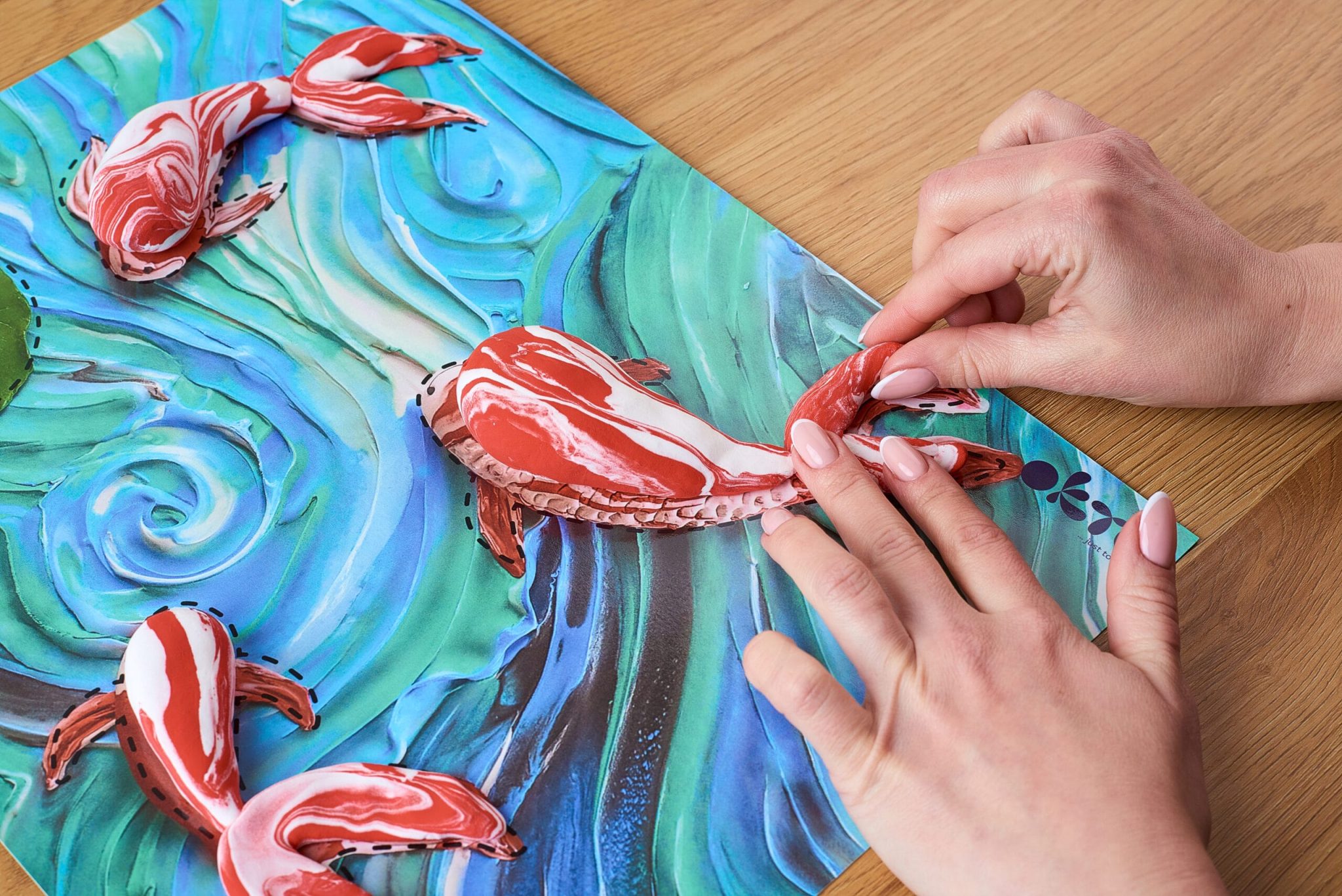 Fill the entire picture with clay and add the final touches.