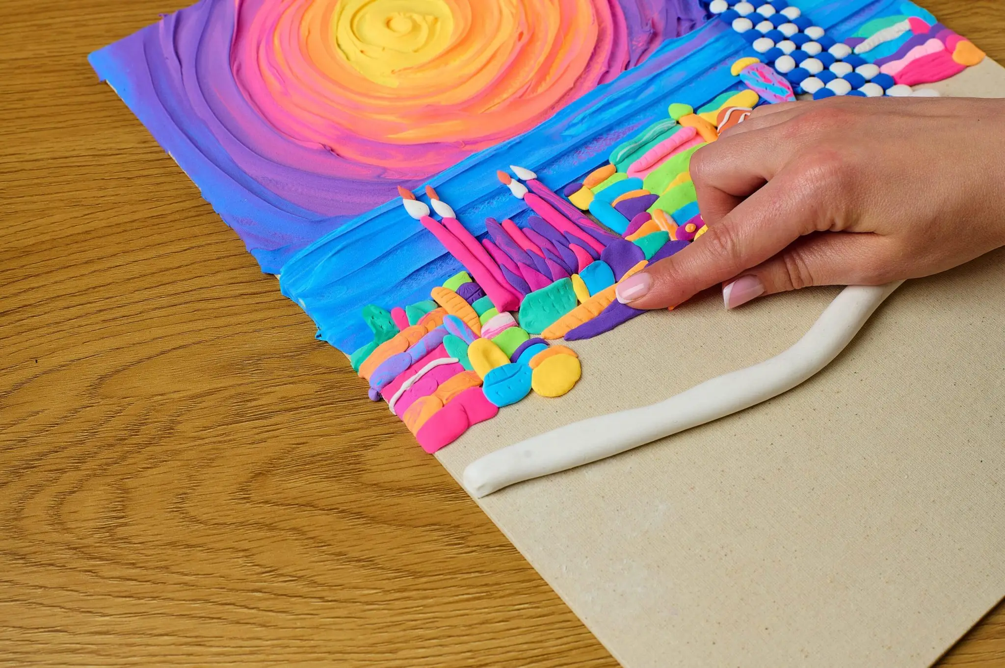 Fill the entire picture with clay and add the final touches.