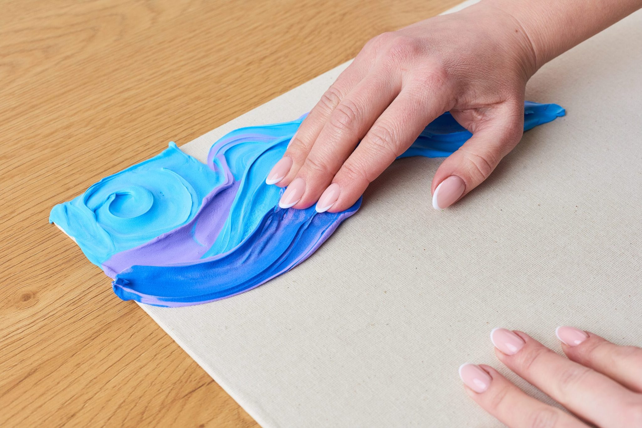 Choose a color and start spreading it with your fingers.