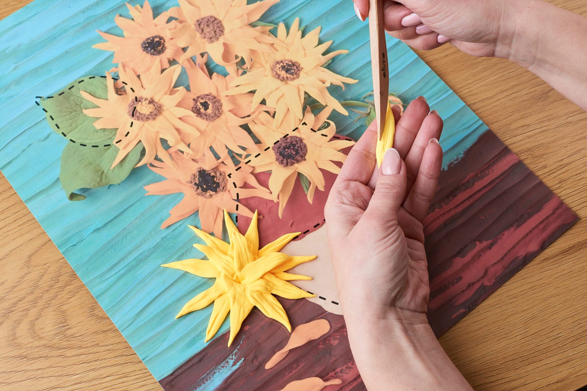 Fill the entire picture with clay and add the final touches.