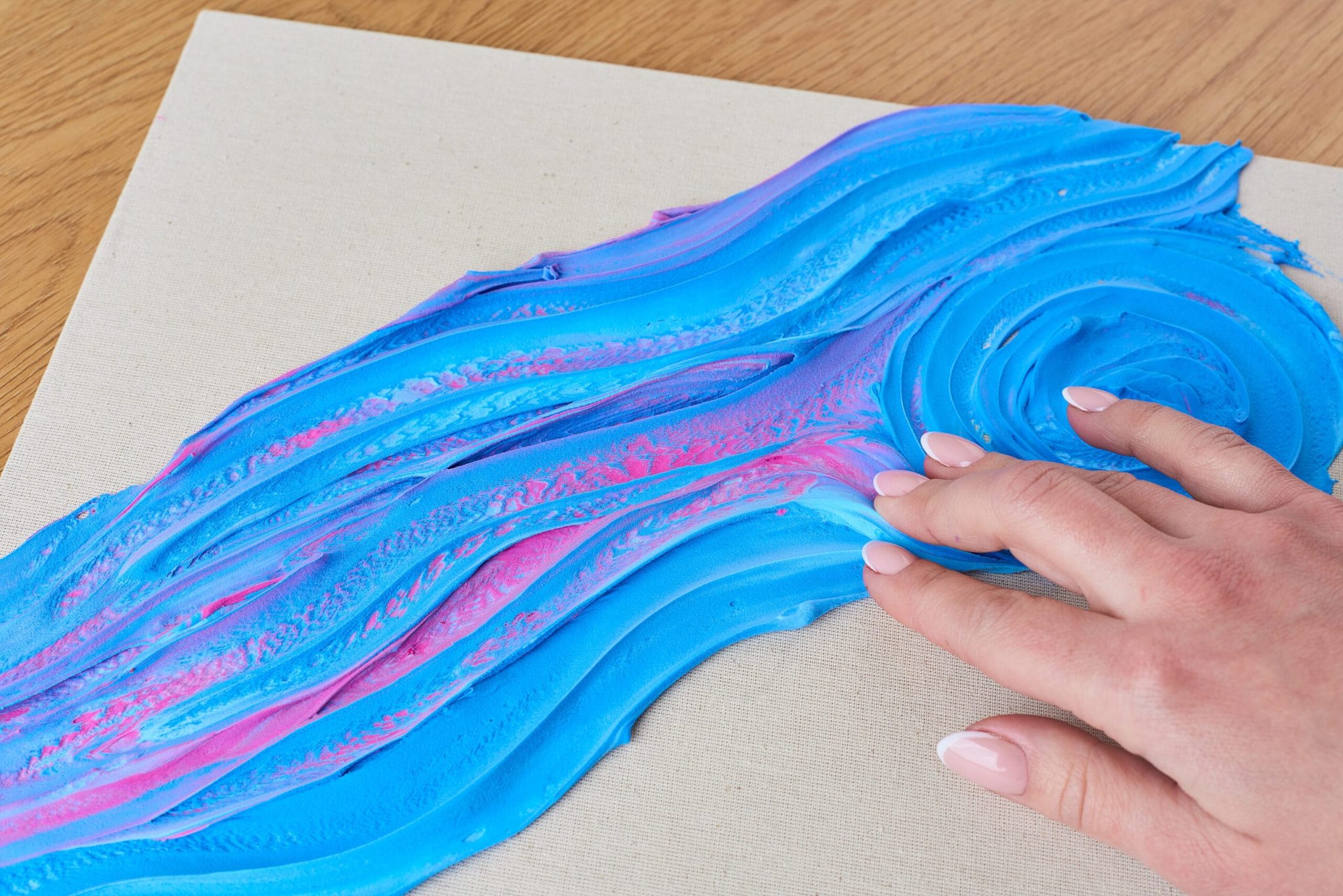 Choose a color and start spreading it with your fingers.
