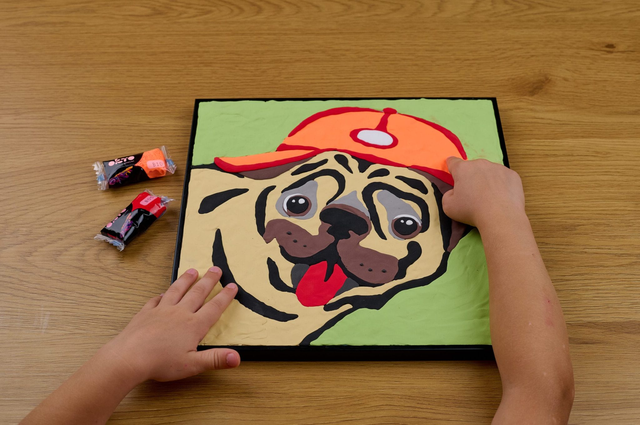 Fill the entire picture with clay and add final touches.